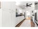 Kitchen with all white cabinets and stainless steel appliances at 2475 Sw 7Th Ave, Ocala, FL 34471