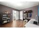 Functional mud room with hooks, storage, and an adjacent home office space at 2475 Sw 7Th Ave, Ocala, FL 34471