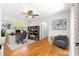 Bright home office with hardwood floors, bookshelf, and serene decor at 2475 Sw 7Th Ave, Ocala, FL 34471