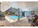 Inviting screened-in pool area with comfortable seating, ideal for relaxation and entertainment at 2475 Sw 7Th Ave, Ocala, FL 34471