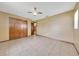 Spacious bedroom features tile floors and natural light at 4331 Se 106Th Pl, Belleview, FL 34420