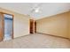 Bedroom showcasing tile flooring and access to private bathroom at 4331 Se 106Th Pl, Belleview, FL 34420
