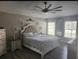 Spacious bedroom with ample natural light, ceiling fan, and stylish decor at 4520 Se 28Th St, Ocala, FL 34480