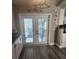 Kitchen doors lead to an outdoor patio area at 4520 Se 28Th St, Ocala, FL 34480