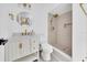 Elegant bathroom featuring a stand-up shower, marble countertop, and gold fixtures at 6 Bahia Circle Loop, Ocala, FL 34472