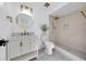 Elegant bathroom featuring a stand-up shower, marble countertop, and gold fixtures at 6 Bahia Circle Loop, Ocala, FL 34472