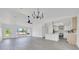 Spacious living room with luxury vinyl plank flooring and a modern ceiling fan at 6 Bahia Circle Loop, Ocala, FL 34472