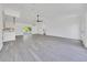 Spacious living room with luxury vinyl plank flooring and a modern ceiling fan at 6 Bahia Circle Loop, Ocala, FL 34472