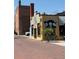 Unique exterior with a colorful mural and brick road, adding artistic charm to the building's facade at 705 Washington Ave, Eustis, FL 32726