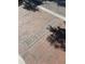 Close-up of a brick street with 'Eustis Street' engraved, blending history with the modern cityscape at 705 Washington Ave, Eustis, FL 32726