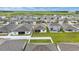 Aerial view of neighborhood with backyard fences, manicured lawns and plentiful outdoor space at 7224 Sw 61St Pl, Ocala, FL 34474
