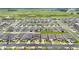 Extensive aerial view of a residential community with uniform landscaping and modern home exteriors at 7224 Sw 61St Pl, Ocala, FL 34474