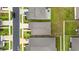 Overhead shot of a neighborhood showcasing houses, neat landscaping, and well-maintained streets at 7224 Sw 61St Pl, Ocala, FL 34474
