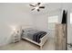 Comfortable bedroom with tile flooring, closet and a window with blinds at 7224 Sw 61St Pl, Ocala, FL 34474