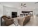 Open concept living room with kitchen, dining area, and comfortable seating at 7224 Sw 61St Pl, Ocala, FL 34474