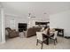 Open-concept living room and dining area with tile flooring and recessed lighting at 7224 Sw 61St Pl, Ocala, FL 34474