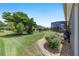Beautiful backyard with mature trees, screened lanai and well-maintained landscaping offering relaxation at 7333 Sw 98Th Ct, Ocala, FL 34481