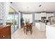 Bright dining area with backyard views and a well-appointed kitchen at 7333 Sw 98Th Ct, Ocala, FL 34481