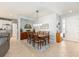 Inviting dining area with access to the kitchen and featuring a decorative buffet at 7333 Sw 98Th Ct, Ocala, FL 34481
