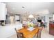 Open-concept dining area flows into the kitchen and living room, great for entertaining and Gathering gatherings at 7333 Sw 98Th Ct, Ocala, FL 34481