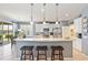 Kitchen offers lots of seating with stainless steel appliances, a breakfast bar that overlooks the outdoor living space at 7333 Sw 98Th Ct, Ocala, FL 34481