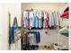 Organized walk-in closet provides ample storage space with clothing racks, shelves, and shoe storage options at 7333 Sw 98Th Ct, Ocala, FL 34481