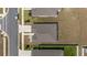 Aerial view of a well-maintained property featuring a dark roof, clean landscaping, and a spacious backyard at 7571 Sw 64Th Street Rd, Ocala, FL 34474