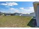 View of the expansive backyard with privacy fence and ample space for activities at 7571 Sw 64Th Street Rd, Ocala, FL 34474
