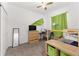 Cozy bedroom with comfortable bed, closet, and modern desk at 7571 Sw 64Th Street Rd, Ocala, FL 34474