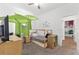 Bedroom with decorative canopy, television, and twin size bed at 7571 Sw 64Th Street Rd, Ocala, FL 34474
