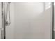 Shower with white subway tile and glass doors at 7571 Sw 64Th Street Rd, Ocala, FL 34474