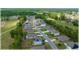 A neighborhood is shown in an aerial view, with neatly lined houses at 96 Hickory Crse, Ocala, FL 34472