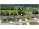 Neighborhood aerial view showcasing the homes, landscaping, and community layout at 96 Hickory Crse, Ocala, FL 34472