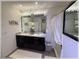 Bathroom features dual sinks and decorative lighting at 96 Hickory Crse, Ocala, FL 34472