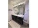 Bathroom features dual sinks, decorative lighting and accents at 96 Hickory Crse, Ocala, FL 34472