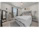 This light-filled bedroom is well-appointed with plush carpets and ample natural light at 96 Hickory Crse, Ocala, FL 34472