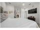 Bright and open bedroom with a queen bed, modern fixtures and ample closet space at 96 Hickory Crse, Ocala, FL 34472