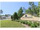 Lake Diamond entrance sign with lush landscaping and a well-maintained community at 96 Hickory Crse, Ocala, FL 34472