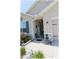 Inviting covered front porch with decorative accents and stylish welcome decor at 96 Hickory Crse, Ocala, FL 34472
