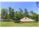 Lake Diamond community entrance sign surrounded by lush landscaping and mature trees at 96 Hickory Crse, Ocala, FL 34472