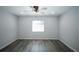Spacious bedroom with modern flooring, neutral paint, and lots of natural light at 10523 Sw 62Nd Terrace Rd, Ocala, FL 34476