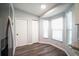 Cozy breakfast nook with bay window and modern flooring, perfect for morning coffee at 10523 Sw 62Nd Terrace Rd, Ocala, FL 34476
