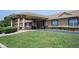 Inviting building exterior with a covered entrance and well-maintained landscaping at 10523 Sw 62Nd Terrace Rd, Ocala, FL 34476