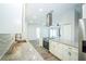 Modern kitchen with granite countertops, stainless steel appliances, and tile backsplash at 10523 Sw 62Nd Terrace Rd, Ocala, FL 34476