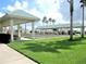 Community bocce ball courts with shaded pavilions and manicured lawns at 11871 Se 91St Cir, Summerfield, FL 34491