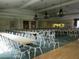 Large dining area with rows of tables and chairs, ideal for events and community gatherings at 11871 Se 91St Cir, Summerfield, FL 34491