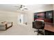Bedroom featuring carpet floors and built-in desk at 12495 Sw 66Th St, Ocala, FL 34481