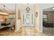 Entryway featuring neutral walls and an arched, decorative glass front door at 12495 Sw 66Th St, Ocala, FL 34481