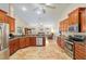 Spacious kitchen open to the living room, featuring granite counters and stainless appliances at 12495 Sw 66Th St, Ocala, FL 34481