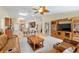 Spacious living area seamlessly connects to the kitchen, perfect for entertaining guests at 12495 Sw 66Th St, Ocala, FL 34481